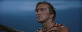 Movie still from “20,000 Leagues Under the Sea” (1954), directed by Richard Fleischer – A person with wet hair; Close Up shot, Low angle