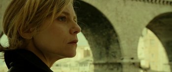 Movie still from “22 Bullets” (2010), directed by Richard Berry – A person looking at something; Close Up shot, Low angle