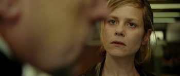 Movie still from “22 Bullets” (2010), directed by Richard Berry – A person looking at the camera; Close Up shot, Over the shoulder angle