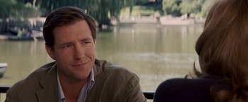 Movie still from “27 Dresses” (2008), directed by Anne Fletcher – A person sitting in a boat on a river; Close Up shot, Over the shoulder angle