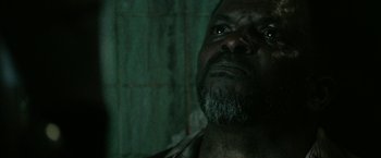 Movie still from “31” (2016), directed by Rob Zombie – A person with a beard looking up; Close Up shot, Low angle