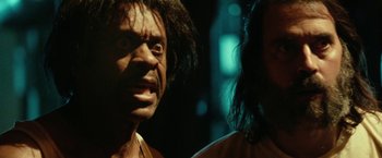 Movie still from “31” (2016), directed by Rob Zombie – A man's face and a woman's face; Close Up shot, Low angle