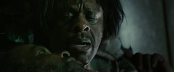 Movie still from “31” (2016), directed by Rob Zombie – A person with a beard; Extreme Close Up shot, Over the shoulder angle