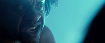 Movie still from “31” (2016), directed by Rob Zombie – A man's face in the water; Extreme Close Up shot, Low angle