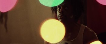 Movie still from “31” (2016), directed by Rob Zombie – A man is looking at a yellow frisbee; Close Up shot, Low angle