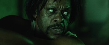 Movie still from “31” (2016), directed by Rob Zombie – A person with a face close to the ground; Close Up shot, Low angle