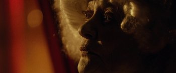 Movie still from “31” (2016), directed by Rob Zombie – An old man with a white beard looking into the distance; Extreme Close Up shot, Low angle