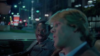 Movie still from “48 Hrs.” (1982), directed by Walter Hill – Two men sitting in the back of a car at night; Close Up shot, Over the shoulder angle