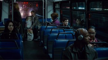 Movie still from “50/50” (2011), directed by Jonathan Levine – People are sitting on a public transit bus; Wide shot, Over the shoulder angle