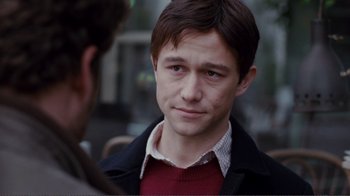 Movie still from “50/50” (2011), directed by Jonathan Levine – A young man is talking to another man outside; Close Up shot, Over the shoulder angle