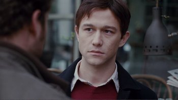 Movie still from “50/50” (2011), directed by Jonathan Levine – A young man is looking at the camera; Close Up shot, Over the shoulder angle