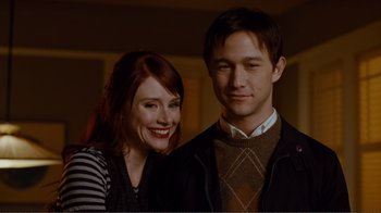 Movie still from “50/50” (2011), directed by Jonathan Levine – A man and a woman posing for a picture; Close Up shot, Over the shoulder angle