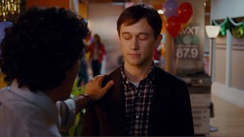 Movie still from “50/50” (2011), directed by Jonathan Levine – A man in a plaid shirt and a brown jacket; Close Up shot, Over the shoulder angle