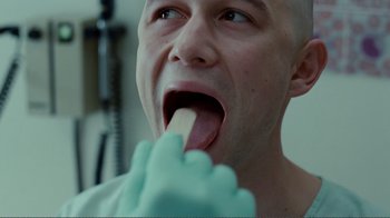 Movie still from “50/50” (2011), directed by Jonathan Levine – A man with a tooth brush in his mouth; Close Up shot, Low angle