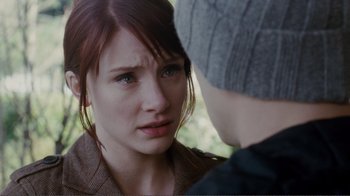 Movie still from “50/50” (2011), directed by Jonathan Levine – A young woman looking at a young man with an unhappy look on her face; Close Up shot, Over the shoulder angle