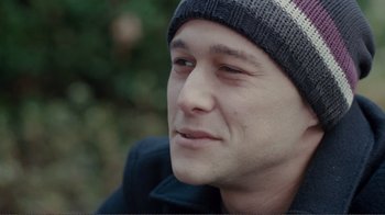 Movie still from “50/50” (2011), directed by Jonathan Levine – A person wearing a hat; Close Up shot, Over the shoulder angle