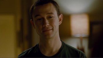 Movie still from “50/50” (2011), directed by Jonathan Levine – A person wearing a green shirt; Close Up shot, Over the shoulder angle