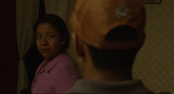 Movie still from “600 Miles” (2015), directed by Gabriel Ripstein – A woman looking at a man in the mirror; Close Up shot, Over the shoulder angle