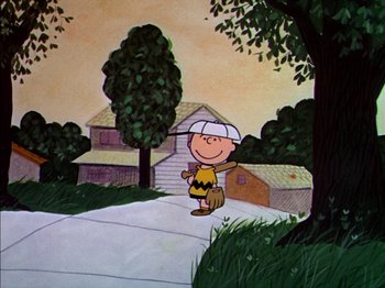 Movie still from “A Boy Named Charlie Brown” (1969), directed by Bill Melendez – A painting of a charlie brown with a bag of peanuts; Extreme Wide shot, High angle