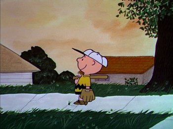 Movie still from “A Boy Named Charlie Brown” (1969), directed by Bill Melendez – A charlie brown baseball player holding a baseball bat; Wide shot, Low angle