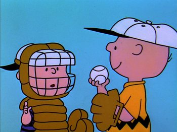 Movie still from “A Boy Named Charlie Brown” (1969), directed by Bill Melendez – A charlie brown and a charlie brown baseball player holding baseballs; Medium shot, Low angle