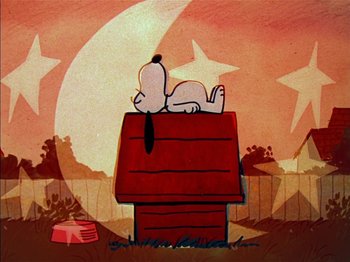 Movie still from “A Boy Named Charlie Brown” (1969), directed by Bill Melendez – A dog sitting on the roof of a dog house; Extreme Wide shot, Low angle