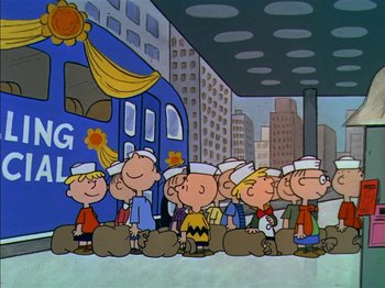 Movie still from “A Boy Named Charlie Brown” (1969), directed by Bill Melendez – A group of cartoon characters in front of a bus; Extreme Wide shot, Low angle