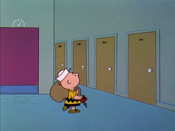 Movie still from “A Boy Named Charlie Brown” (1969), directed by Bill Melendez – A charlie brown character is walking in a hallway; Extreme Wide shot, High angle