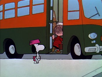 Movie still from “A Boy Named Charlie Brown” (1969), directed by Bill Melendez – A cartoon of a dog looking out of a double decker bus; Extreme Wide shot, High angle