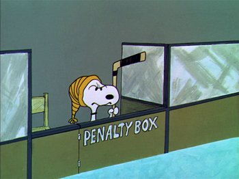 Movie still from “A Boy Named Charlie Brown” (1969), directed by Bill Melendez – A cartoon of a dog in a penalty box; Extreme Wide shot, High angle