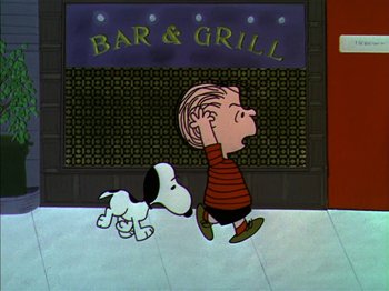 Movie still from “A Boy Named Charlie Brown” (1969), directed by Bill Melendez – A charlie brown and snoopy dog walking down the sidewalk; Medium shot, Low angle