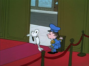 Movie still from “A Boy Named Charlie Brown” (1969), directed by Bill Melendez – A cartoon of a dog chasing a man in a uniform; Wide shot, High angle