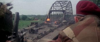 Movie still from “A Bridge Too Far” (1977), directed by Richard Attenborough – An image of a scene in a movie; Extreme Wide shot, High angle