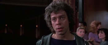 Movie still from “A Chorus Line” (1985), directed by Richard Attenborough – A person wearing a jacket; Close Up shot, Low angle