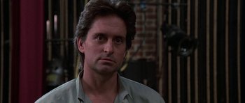 Movie still from “A Chorus Line” (1985), directed by Richard Attenborough – A person with long hair; Close Up shot, Low angle