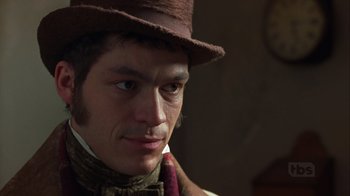 Movie still from “A Christmas Carol” (1999), directed by David Hugh Jones – A person wearing a hat; Close Up shot, Low angle