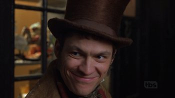 Movie still from “A Christmas Carol” (1999), directed by David Hugh Jones – A person wearing a top hat; Close Up shot, Low angle