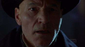 Movie still from “A Christmas Carol” (1999), directed by David Hugh Jones – An older man with a hat and a beard; Close Up shot, Low angle