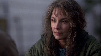 Movie still from “A Civil Action” (1998), directed by Steven Zaillian – A person with long hair; Close Up shot, Over the shoulder angle