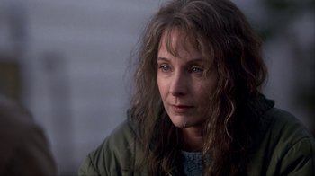 Movie still from “A Civil Action” (1998), directed by Steven Zaillian – A person with long hair; Close Up shot, Over the shoulder angle