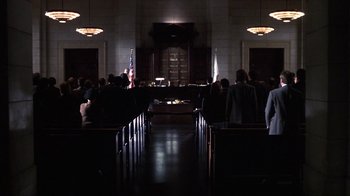 Movie still from “A Civil Action” (1998), directed by Steven Zaillian – A group of people standing in front of a courtroom; Extreme Wide shot, High angle