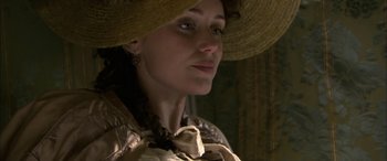 Movie still from “Tristram Shandy” (2005), directed by Michael Winterbottom – A person wearing a hat; Close Up shot, Over the shoulder angle
