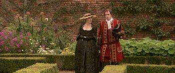 Movie still from “Tristram Shandy” (2005), directed by Michael Winterbottom – A man and a woman dressed in period clothing; Medium shot, Over the shoulder angle
