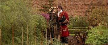 Movie still from “Tristram Shandy” (2005), directed by Michael Winterbottom – A man and a woman dressed in period clothing; Medium shot, Over the shoulder angle