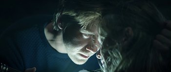 Movie still from “Department Q: A Conspiracy of Faith” (2016), directed by Hans Petter Moland – A man and a woman face to face; Close Up shot, Low angle