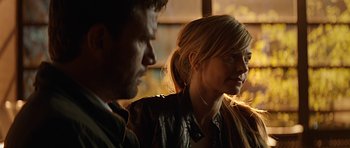 Movie still from “Department Q: A Conspiracy of Faith” (2016), directed by Hans Petter Moland – A man and a woman looking at each other; Close Up shot, Over the shoulder angle