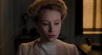 Movie still from “A Dangerous Method” (2011), directed by David Cronenberg – A young woman in a victorian era dress; Close Up shot, High angle