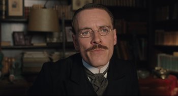 Movie still from “A Dangerous Method” (2011), directed by David Cronenberg – A man in a suit and tie with a goatee; Close Up shot, Low angle