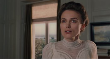 Movie still from “A Dangerous Method” (2011), directed by David Cronenberg – A person in a room near a window; Close Up shot, Over the shoulder angle