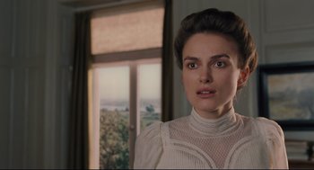 Movie still from “A Dangerous Method” (2011), directed by David Cronenberg – A person in a room near a window; Close Up shot, Over the shoulder angle